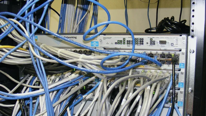 Network switch buried in a tangle of cables