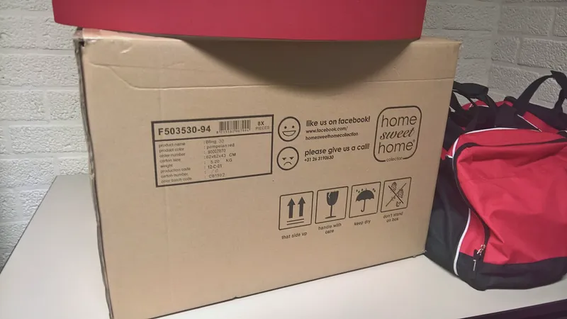 Open cardboard moving boxes on an office floor