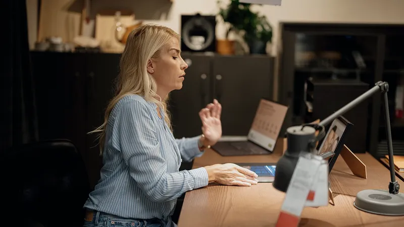 Experienced professional working at a laptop in a quiet office