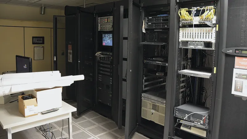 Small server room with open equipment racks